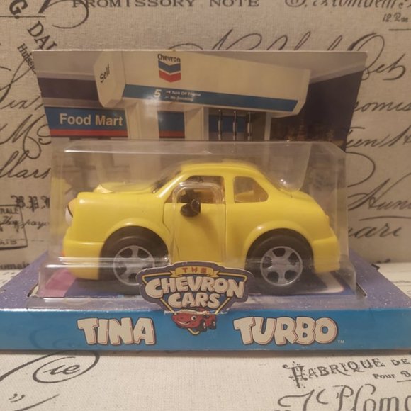 Yellow Chevron Cars Tina Turbo Toy Car 1998 - Picture 1 of 6